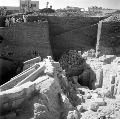 Pieces of the lighthouse, more than 500 feet high. Some of the old stones were picked up, after they fell down in an earthquake in the 14th century a. d., and put into a castle. Other pieces fell into the sea (some fishermen are fishing from one of them). You can see some of the original foundations, and other stones built into the castle in Alexandria, Egypt on Dec. 17, 1964. (AP Photo/Jim Becker)