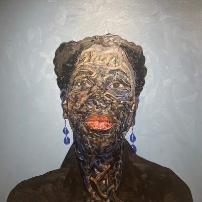 A painting of a Black woman wearing blue earrings. The paint on her skin is smeary.