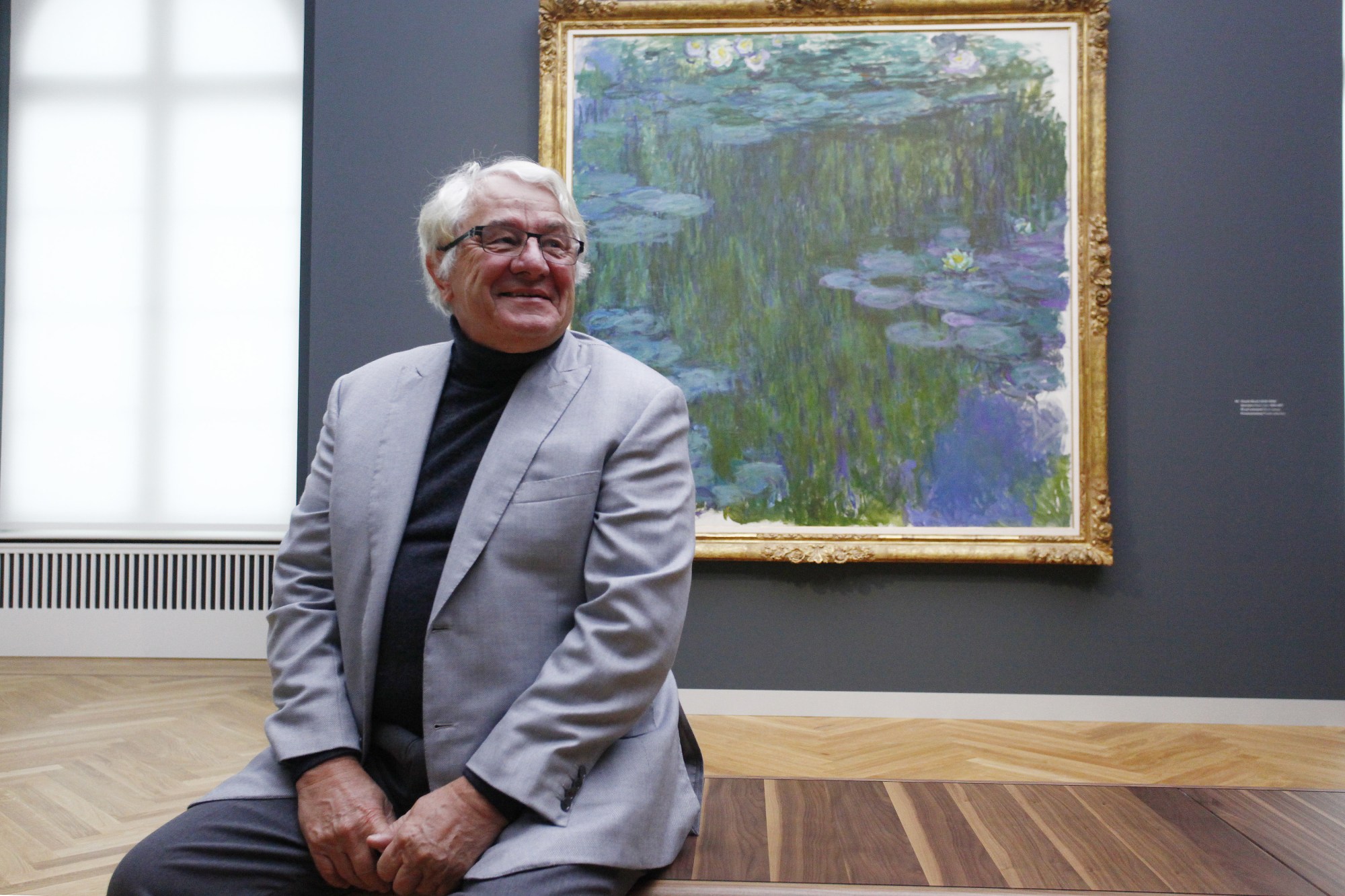 POTSDAM, GERMANY - JANUARY 19: Hasso Plattner, who is co-founder of German software maker SAP and a financial backer of the Barberini Museum,  poses in front of The painting of the french impressionist Monet titled Water Lilies during a press preview on January 19, 2017 in Potsdam, Germany. The art museum will have a permanent collection from Plattner's foundation that focuses on 20th century German art, both from West and East Germany. The museum opens to the public on January 23 with an exhibition on Impressionist landscapes. (Photo by Michele Tantussi/Getty Images) Local Caption *** Hasso Plattner; Ortrud Westheider.